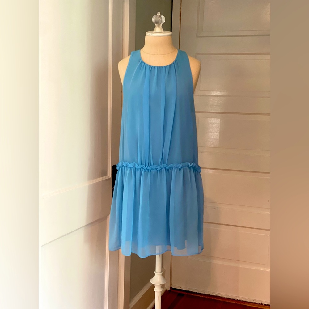 Likely brand mini dress. Drop waist, loose fit. Flirty and fun! Gently worn.
